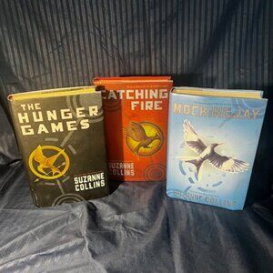 The Hunger Games series written by Suzanne Collins hardcover trilogy (3 books)